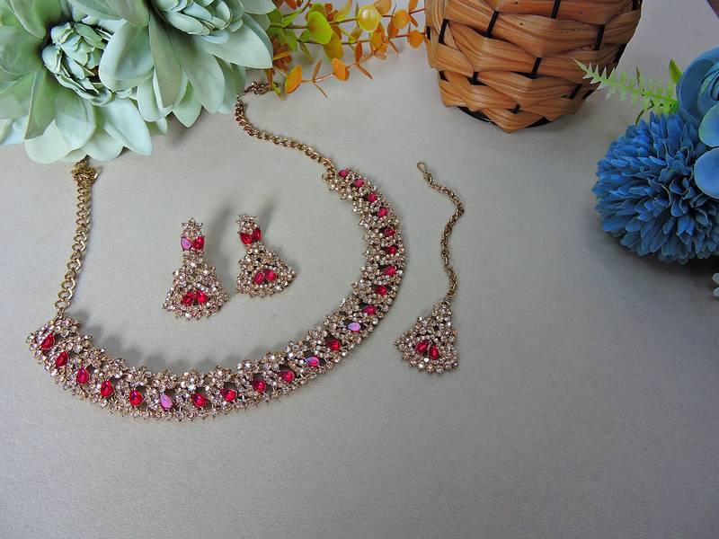 Pink color yellow gold plating festive wear designer necklace set