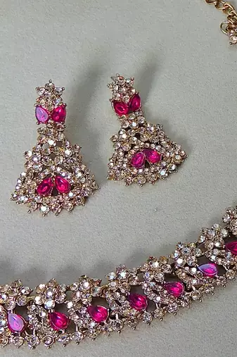 Pink color yellow gold plating festive wear designer necklace set