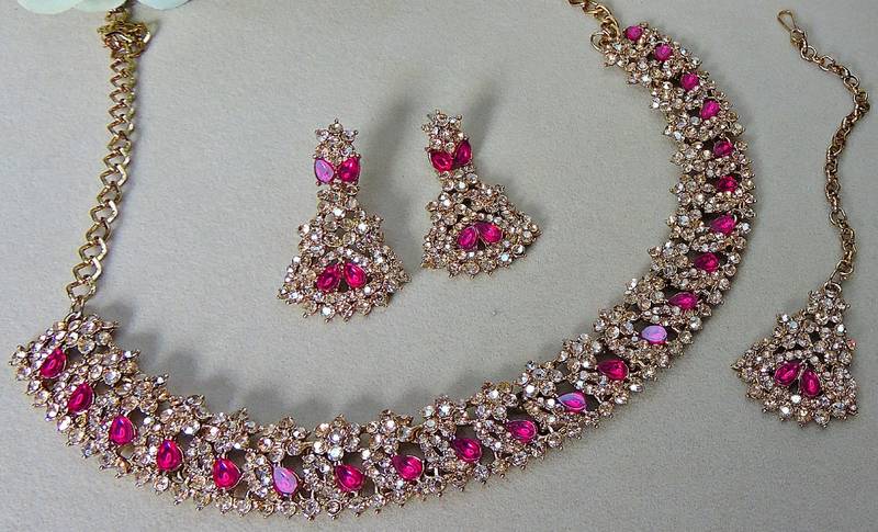 Pink color yellow gold plating festive wear designer necklace set