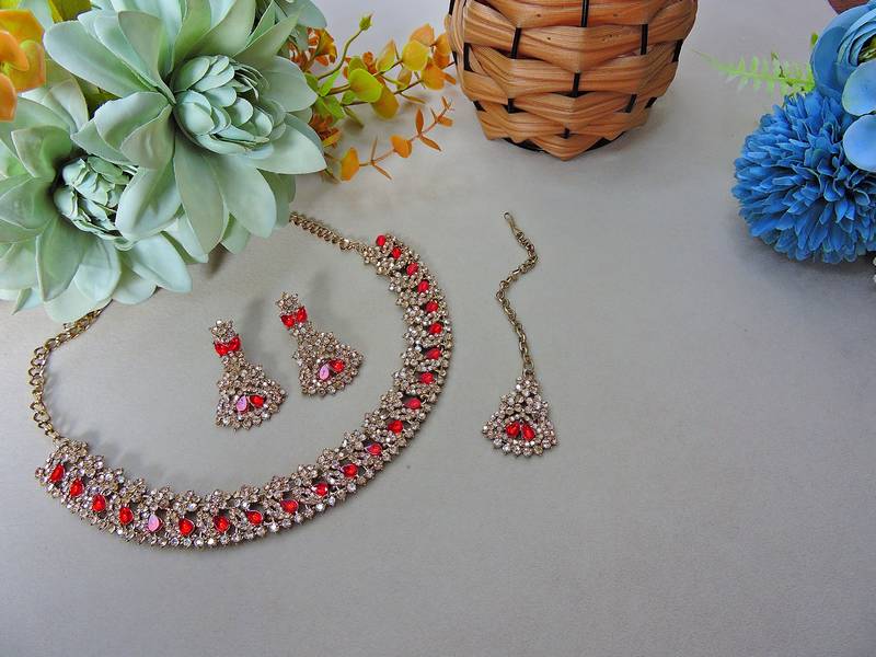 Red color yellow gold plating festive wear designer necklace set