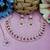 Pink color rhodium plating festive wear designer necklace set