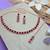 Maroon color rhodium plating festive wear designer necklace set