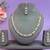 Green color rhodium plating festive wear designer necklace set