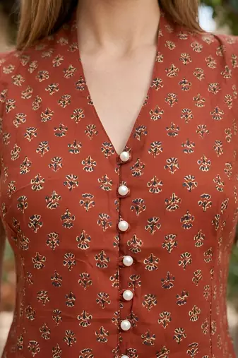 Orange cotton printed top for women