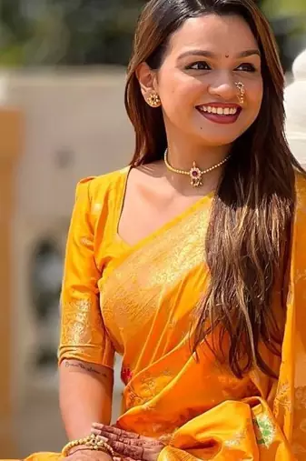 yellow woven design zari silk blend banarasi saree