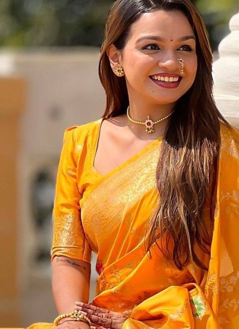 yellow woven design zari silk blend banarasi saree
