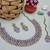 Purple color yellow gold plating festive wear designer necklace set
