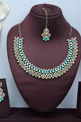 Green color yellow gold plating festive wear designer necklace set