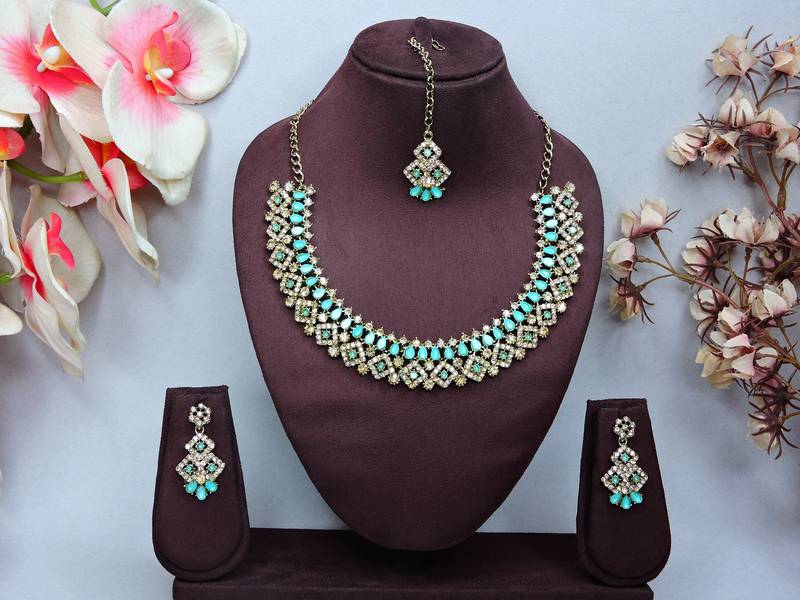 Green color yellow gold plating festive wear designer necklace set