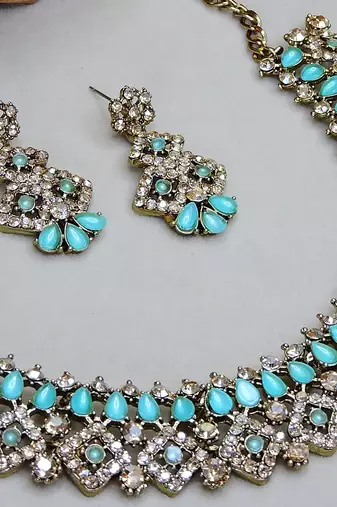 Green color yellow gold plating festive wear designer necklace set