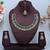 Green color yellow gold plating festive wear designer necklace set