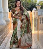 green woven design zari silk blend banarasi saree