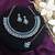 Green color rhodium plating festive wear designer necklace set