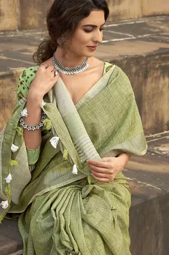 green woven zari linen saree with unstitched blouse piece