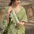 green woven zari linen saree with unstitched blouse piece