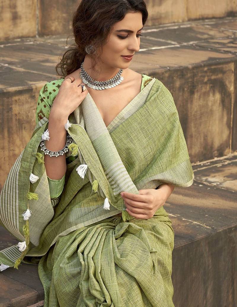 green woven zari linen saree with unstitched blouse piece