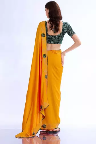 yellow ethnic motifs embroidered silk blend bandhani saree