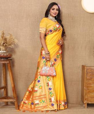 yellow woven design zari silk blend paithani saree 4