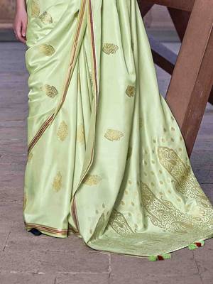 green woven design zari saree 4