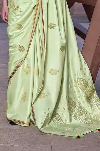 green woven design zari saree