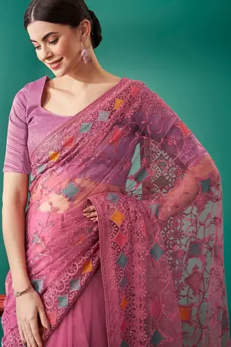 pink ethnic motifs embroidered net heavy work saree