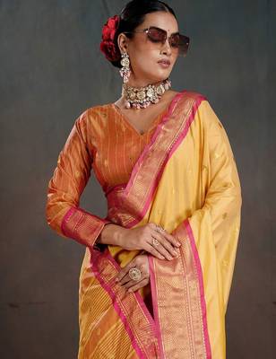 yellow woven design zari silk blend heavy work banarasi saree 1