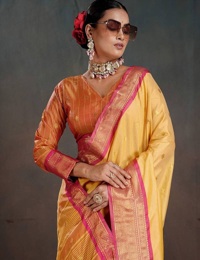 yellow woven design zari silk blend heavy work banarasi saree