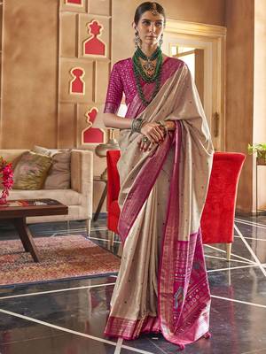 beige woven design zari silk blend patola saree 1