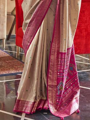 beige woven design zari silk blend patola saree 3