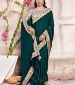 teal embroidered silk blend saree