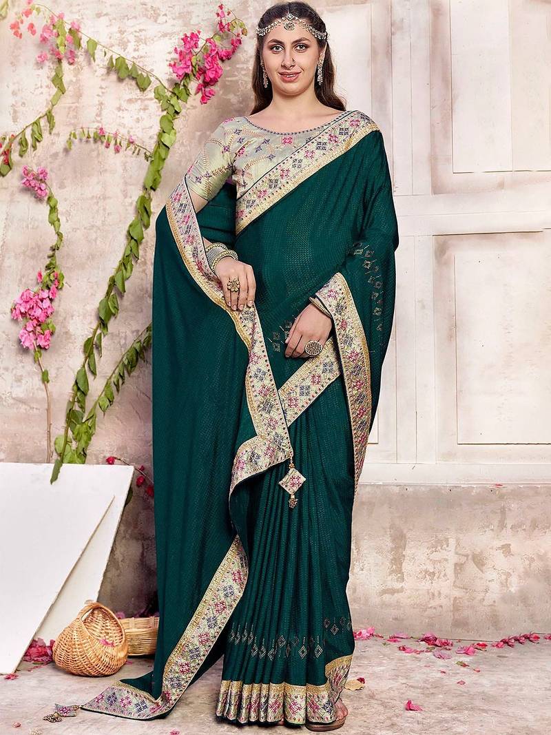 teal embroidered silk blend saree