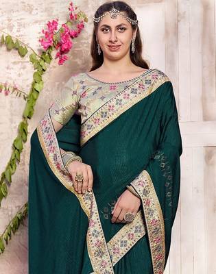 teal embroidered silk blend saree 2
