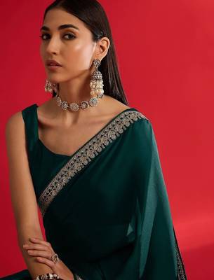 green embroidered satin saree 5