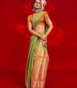 green woven design zari banarasi saree