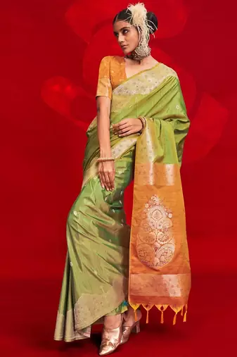 green woven design zari banarasi saree