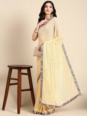 yellow embellished beads & stones pure georgette heavy work saree 1