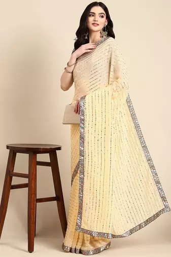 yellow embellished beads & stones pure georgette heavy work saree