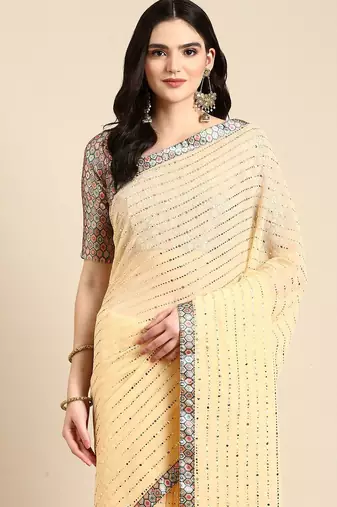 yellow embellished beads & stones pure georgette heavy work saree