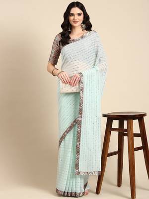 sea_green embellished beads & stones pure georgette heavy work saree 1