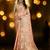 peach ethnic motifs woven design zari organza banarasi saree