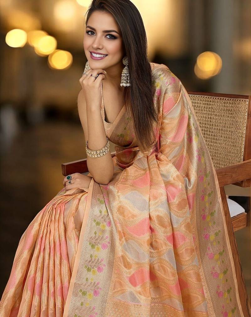 peach ethnic motifs woven design zari organza banarasi saree