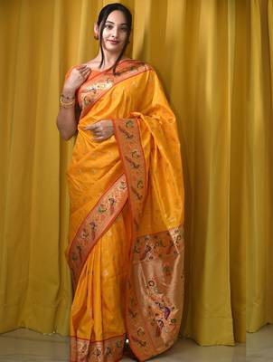 yellow woven design zari paithani saree 1