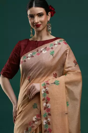 beige woven design zari muga saree