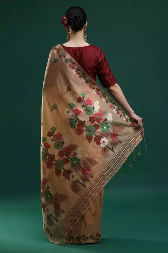 beige woven design zari muga saree