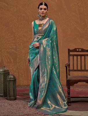 teal woven design zari silk blend kanjeevaram saree with matching blouse 1