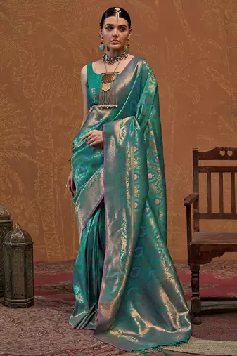 teal woven design zari silk blend kanjeevaram saree with matching blouse