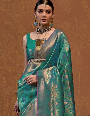 teal woven design zari silk blend kanjeevaram saree with matching blouse 4