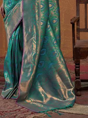teal woven design zari silk blend kanjeevaram saree with matching blouse 5