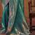 teal woven design zari silk blend kanjeevaram saree with matching blouse