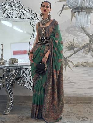green ethnic motifs woven design zari silk blend banarasi saree 1